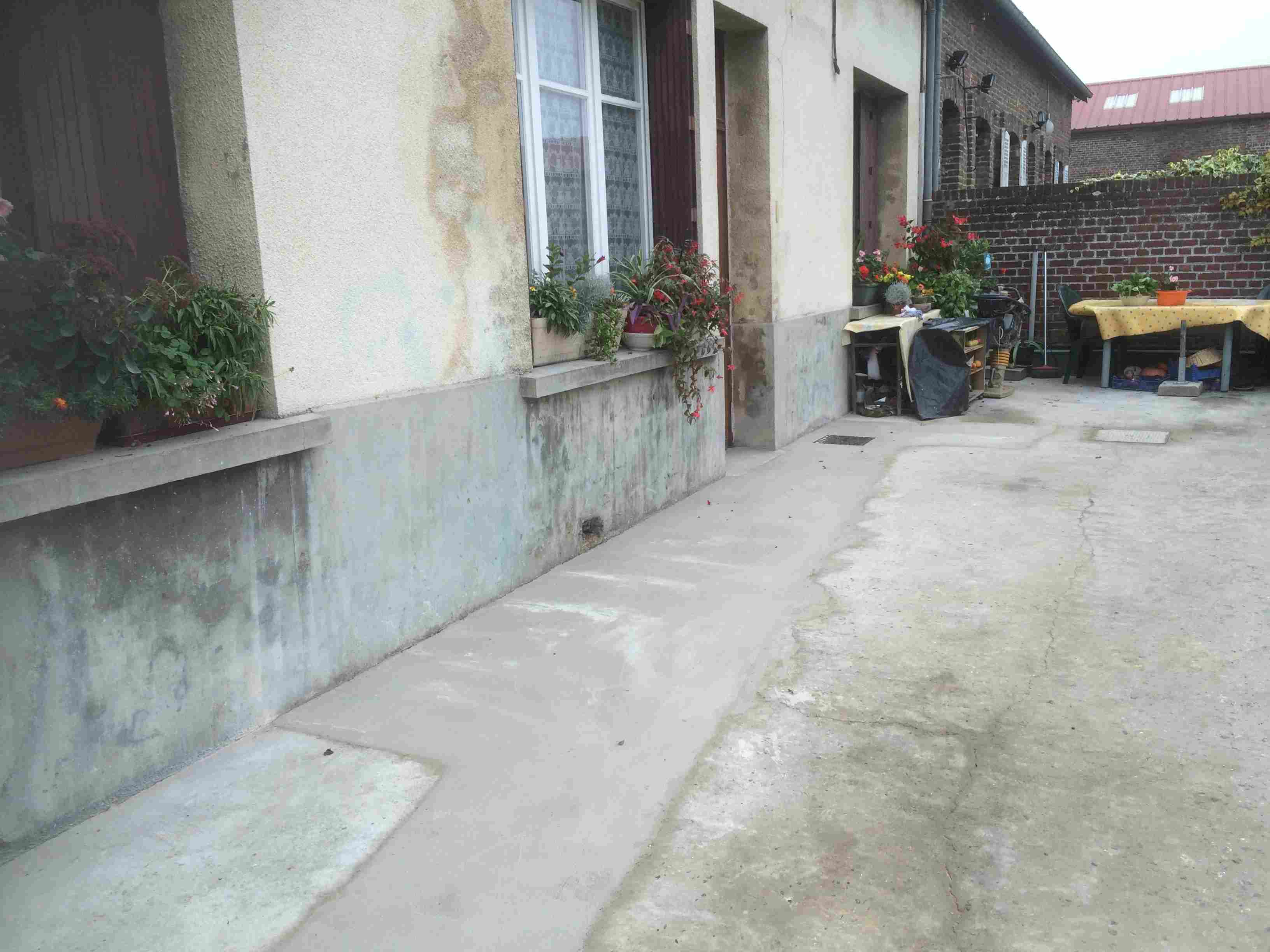 Tout à l'égout terrasse béton agrandissement